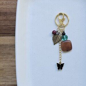 Brown Stone Beaded Keychain with Gold Leaf and Black Butterfly Charms